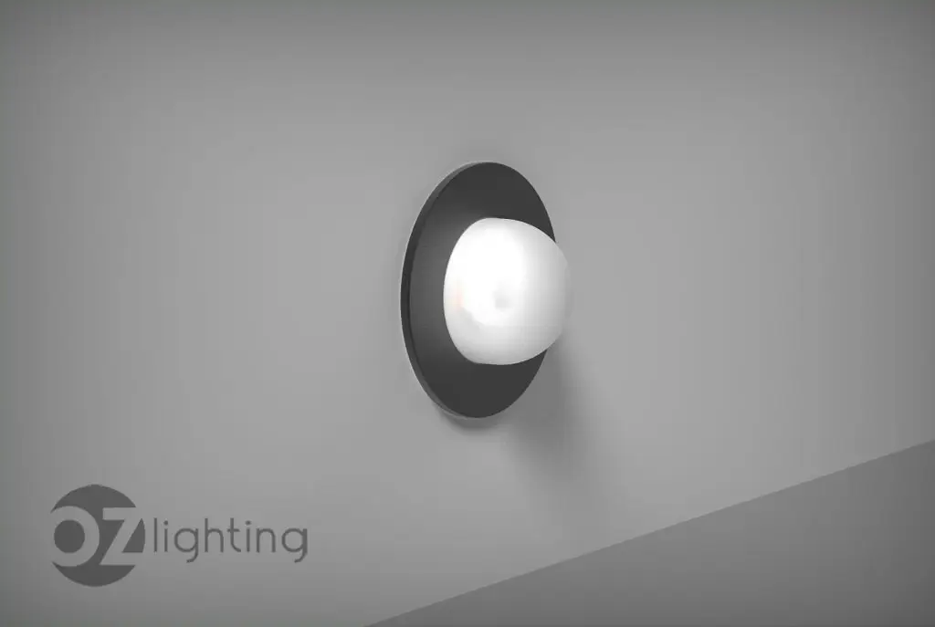 Minimalist spherical surface-mounted wall luminaire "Dome" by OZ Lighting, showcasing high-end Austrian craftsmanship for ambient architectural illumination.